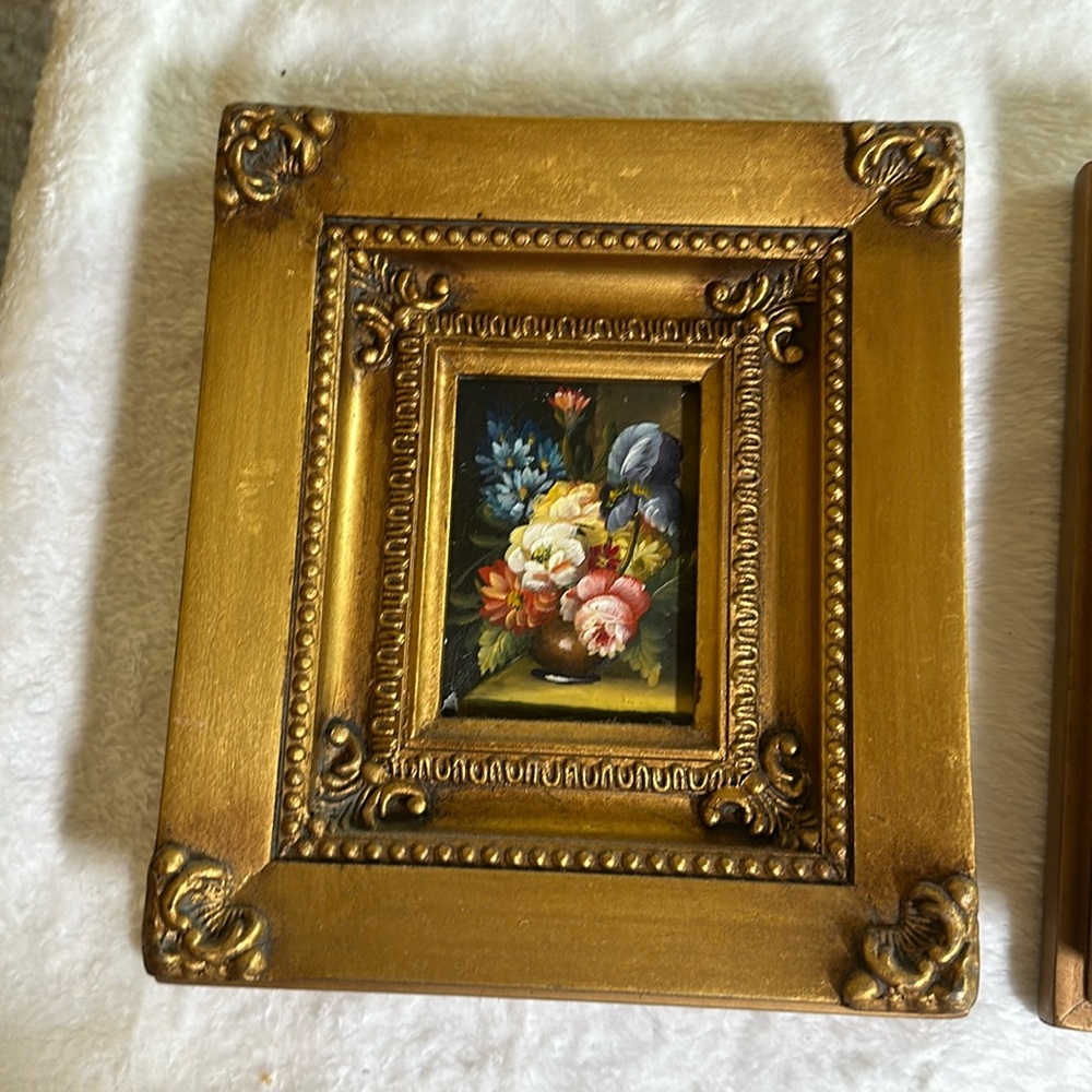 Set of 2 floral paintings in ornate frames